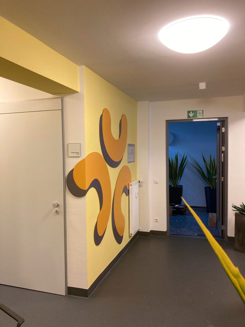Wall in a corridor with logo